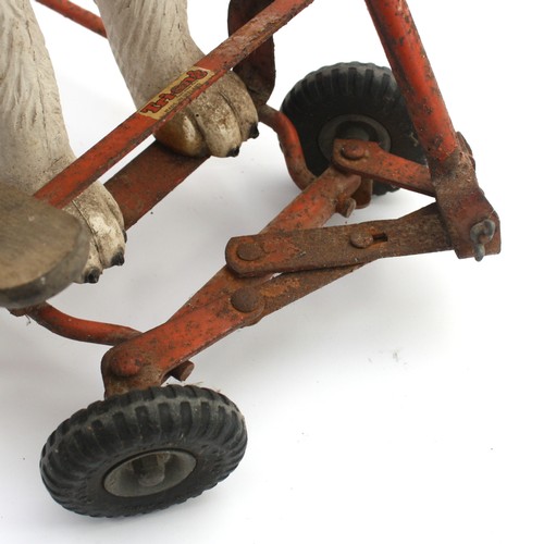 58 - A 1950s Triang push and ride along toy, modelled after a Saint Bernard dog.