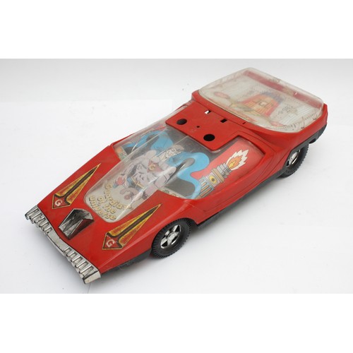 59 - A collection of vintage toys to include a boxed tinplate 'Toy-Town' telephone exchange, a Peter Pan ... 