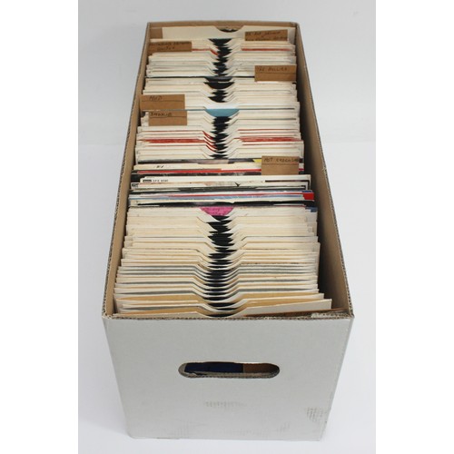 138 - A Large collection of Vinyl singles along with some Bad Company LP's to include artists, The Rolling... 
