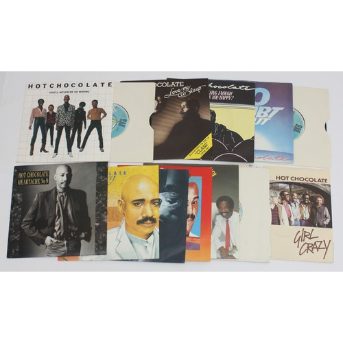 138 - A Large collection of Vinyl singles along with some Bad Company LP's to include artists, The Rolling... 