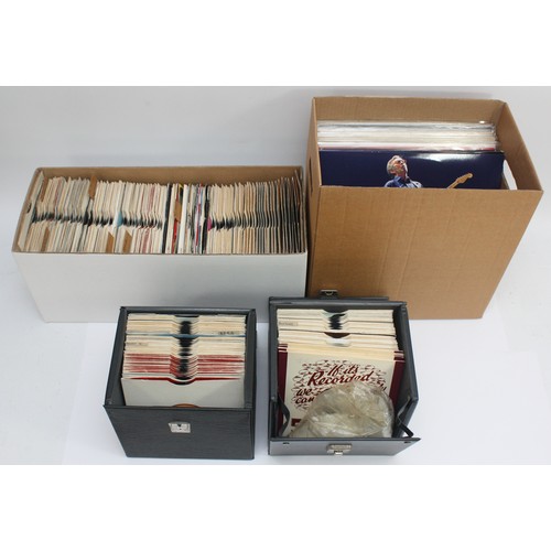 138 - A Large collection of Vinyl singles along with some Bad Company LP's to include artists, The Rolling... 