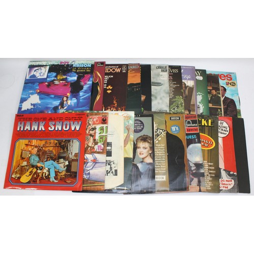 159 - A collection of 21 primarily 60's-80's pop vinyl LP's including artists such as, Roy Orbison, Cliff ... 