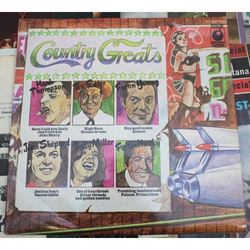 159 - A collection of 21 primarily 60's-80's pop vinyl LP's including artists such as, Roy Orbison, Cliff ... 
