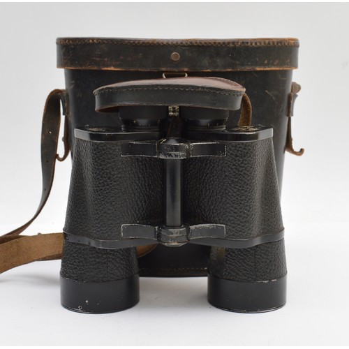 WWII German Third Reich pair of 7x50 Marluxon binoculars, by Busch Rathenow, patented '318905', optics No '159', as well as the eagle with swastika over 'M', complete with the lens cover and cased, Swastika has been removed.