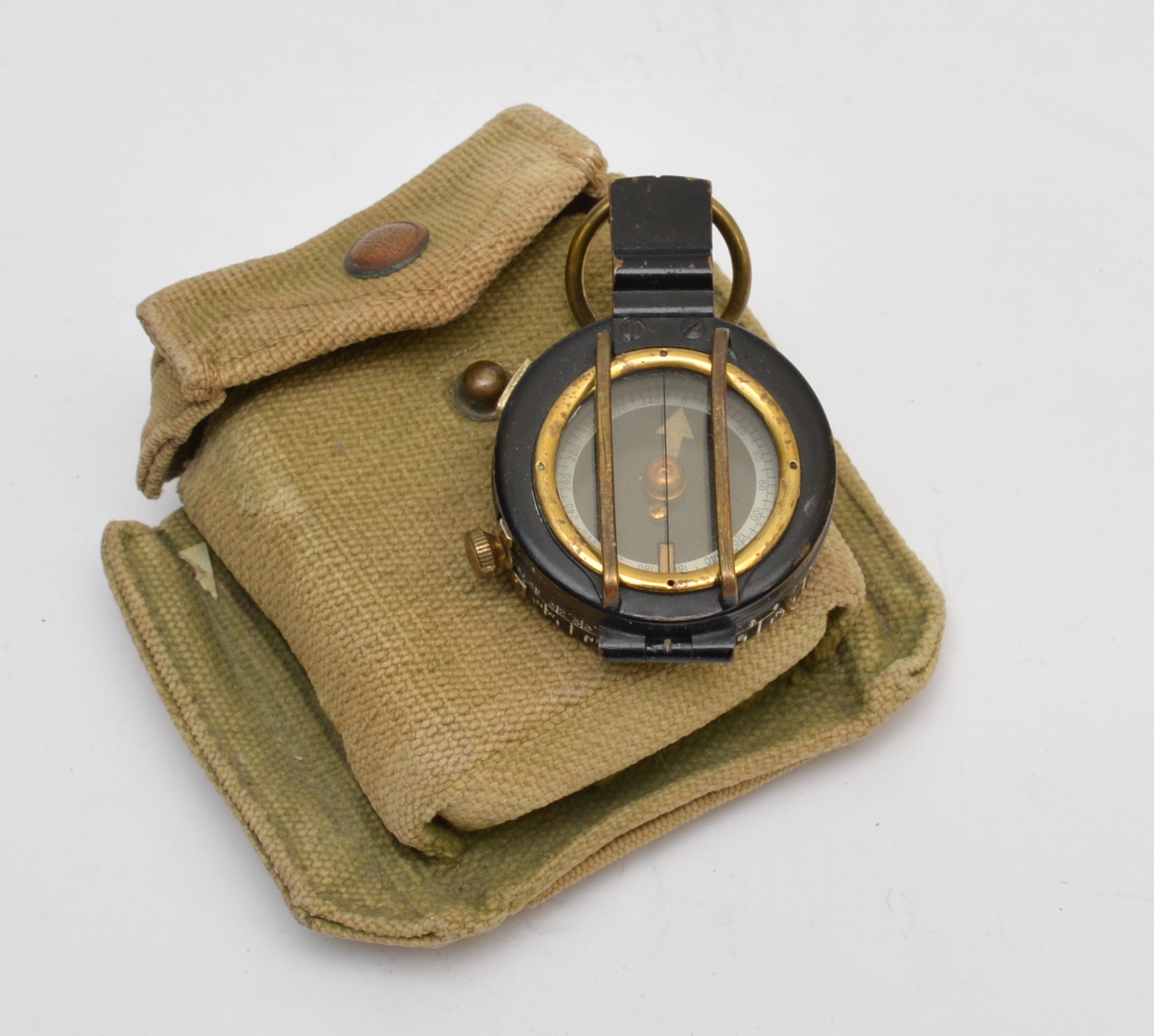 WWII CKC/C military compass, patented 98010, dated 1942, cased in a ...