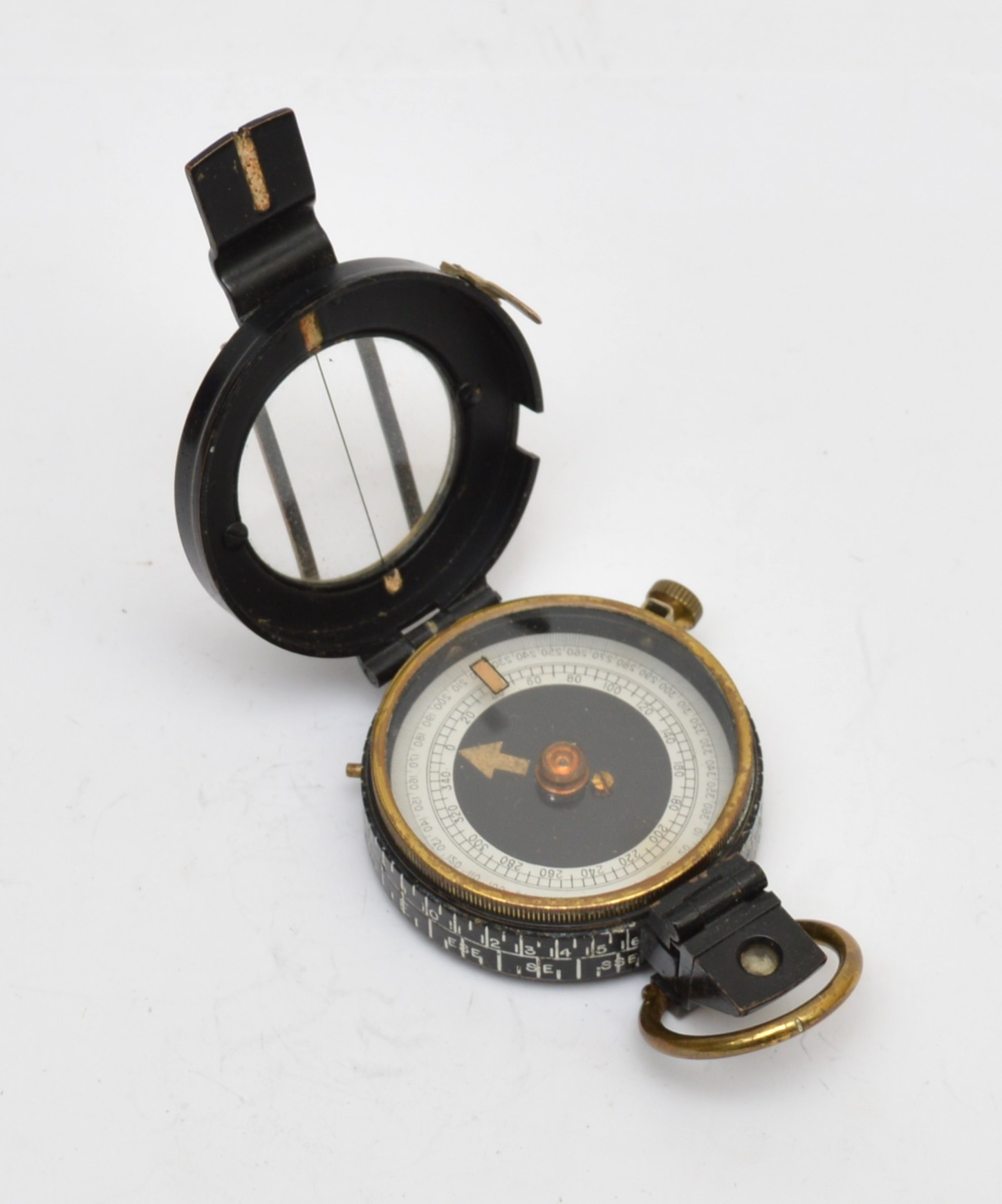 WWII CKC/C military compass, patented 98010, dated 1942, cased in a ...