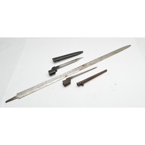 299 - A British No. 9 MKI E-51 bayonet, with scabbard, together with a spike bayonet, patented '65' and a ... 