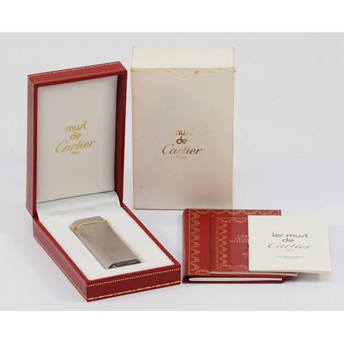 Cartier, a brushed steel lighter, with three colour band
