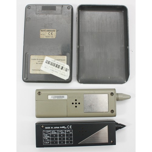 4 - Two electronic diamond testers and a set of scales