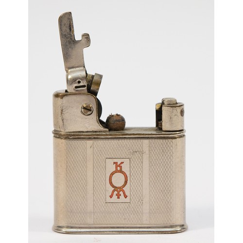 1950's cigarette lighters A 1950s Zunder 1000 pocket cigarette lighter, nickel plated case with  engine turned decoration, semi