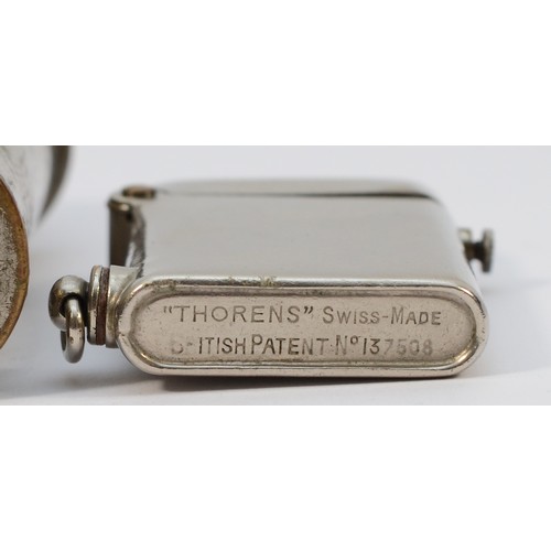 german cigarette lighter A 1930s K.W. German table cigarette lighter, petrol operated, semi  automatic action, together with a