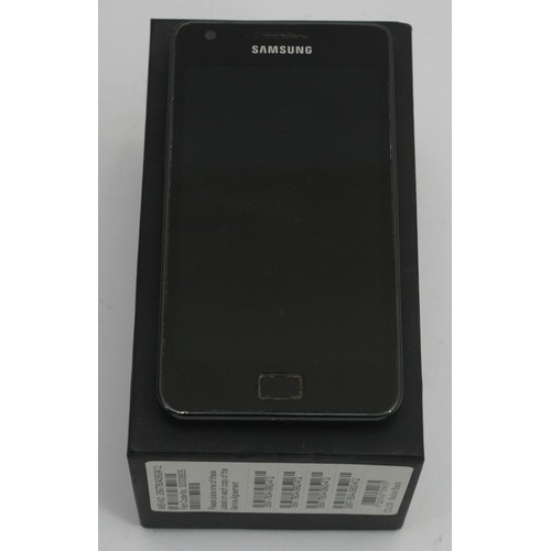 57 - Samsung SII GT19100 mobile telephone, locked, box