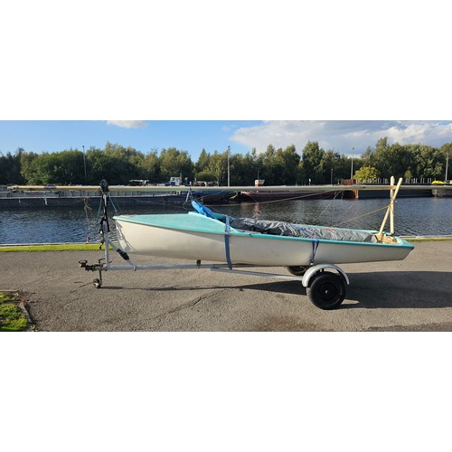 A Lark sailing dinghy, with main, spinnaker and jib, fully rigged, two rudders, dagger board, cover, ladies unused medium wetsuit, road trailer. Sail number 730.
The Lark was designed in 1966 by Michael Jackson, designer of many National 12 and Merlin Rockets, with the first one launched in 1967. The hull made of G.R.P. is 4.065 metres in length, and carries a sail area of 9.75 square metres upwind and a spinnaker of 7.4 square metres. The class currently has a Portsmouth Yardstick of 1073, making it one of the fastest non-trapeze dinghies around!