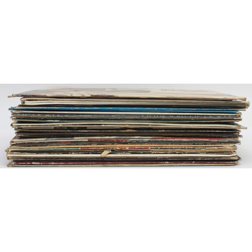 A collection of over 25 pop, rock and roll and compilation vinyl LP's ...