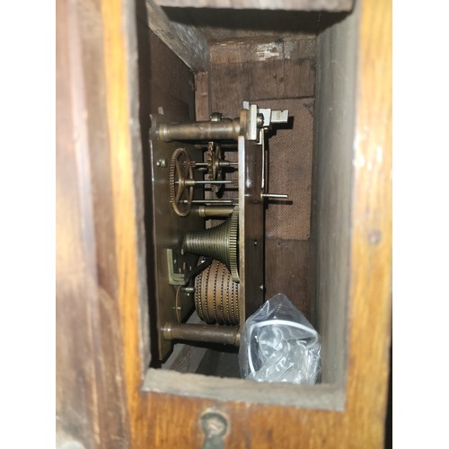 A 19th century oak fusee wall clock, the 14 inch dial painted with ...