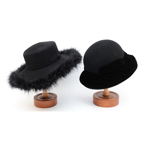 22 - Philip Treacy Black brimmed hat with fur trim, together with a Sandra Phillips black felt cloche wit... 
