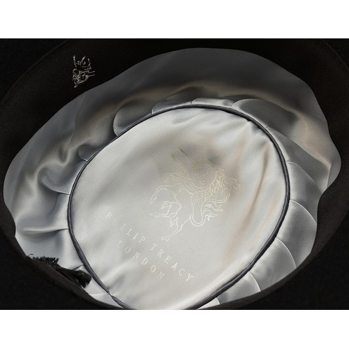 22 - Philip Treacy Black brimmed hat with fur trim, together with a Sandra Phillips black felt cloche wit... 