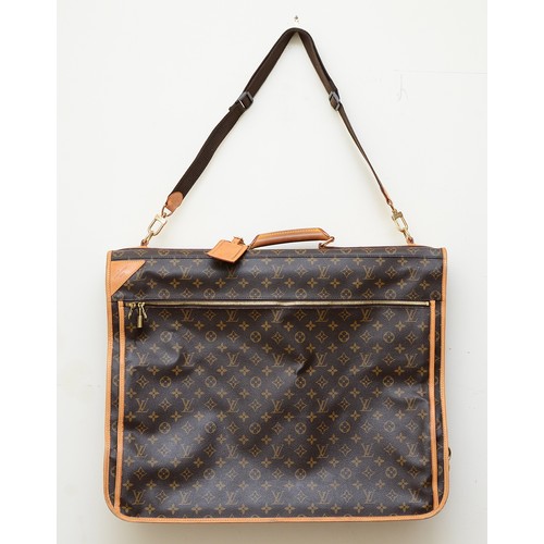 Louis Vuitton Suit/Dress carrier, brown monogram, includes two hanging hooks, internal shoe pouch, detachable pouch 50 x 50cm, internal zip pocket, external zip pocket, unfolded 90cm, folded 60cm, ref no. SP0999, Made in France.
Purchased c.2010, unused only on four or five occasions, very good condition, nearly unused