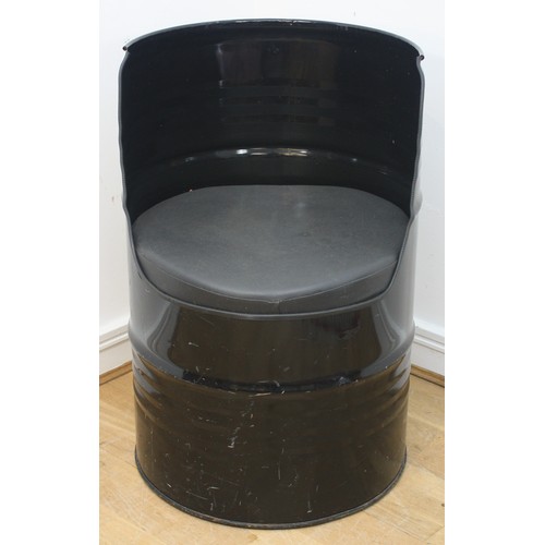 43 - A large painted black oil drum, converted into a seat, with cushion, 87cm tall.