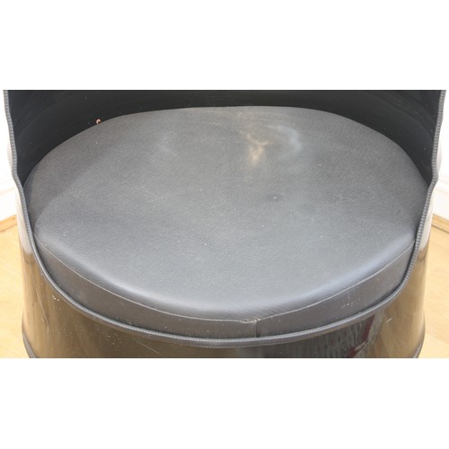 43 - A large painted black oil drum, converted into a seat, with cushion, 87cm tall.