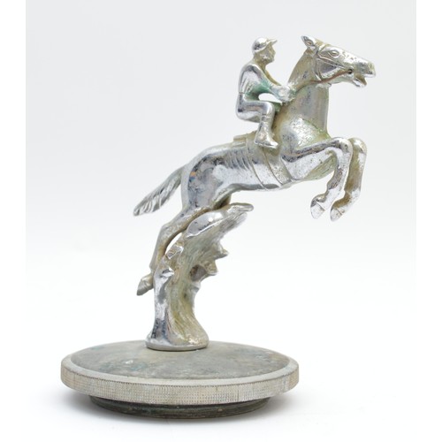 A Desmo vintage leaping horse and jockey car mascot, signed, mounted on a radiator cap, height 16cm, diameter of cap 10.5cm
