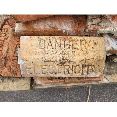11 - A quantity of approximately one hundred reclaimed terracotta interlocking electricity cable covers, ... 