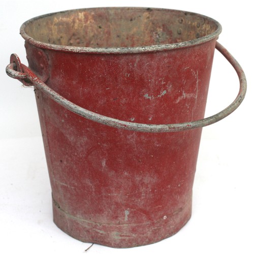 19 - An Air Ministry fire bucket, stamped 'A M. 21F/22. B.S. 1689. H. G. 1956', coated in vibrant red pai... 