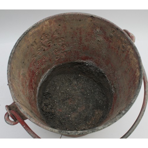 19 - An Air Ministry fire bucket, stamped 'A M. 21F/22. B.S. 1689. H. G. 1956', coated in vibrant red pai... 
