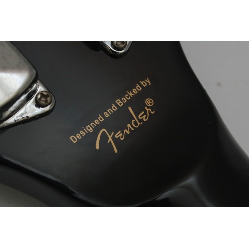 27 - A Fender Squire acoustic guitar.