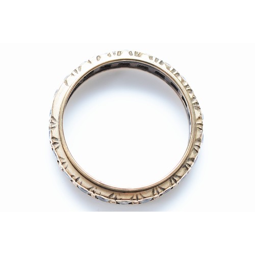 35 - A 9ct gold gemset eternity ring, vacant settings, L 1/2, 2.4g