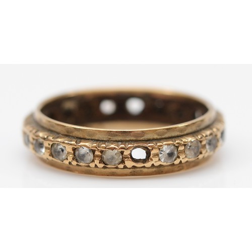 35 - A 9ct gold gemset eternity ring, vacant settings, L 1/2, 2.4g