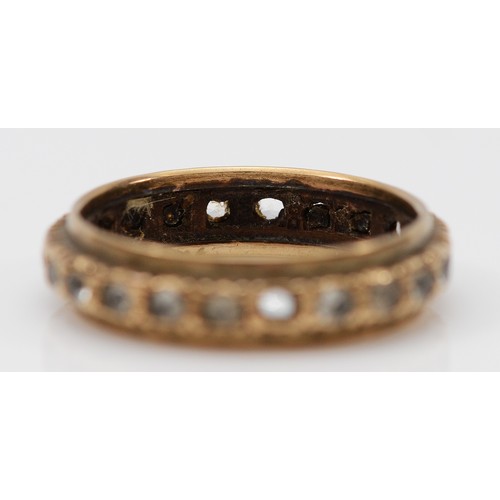 35 - A 9ct gold gemset eternity ring, vacant settings, L 1/2, 2.4g