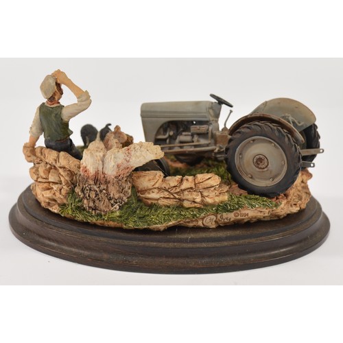 39 - A Country Artists figural group, entitled Helping Hand, model no. CA 731, depicting a tractor stoppe... 