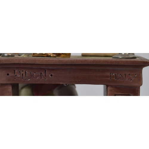 41 - Capodimonte; two figural porcelain sculptures, one depicting an unhoused individual on a park bench ... 