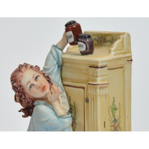 42 - Capodimonte; three figural porcelain sculptures, depicting a young boy washing his hands, h. 14cm, a... 