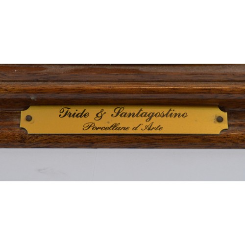 43 - Capodimonte; a large figural group, depicting a Romani woman with an infant on her lap and an adoles... 