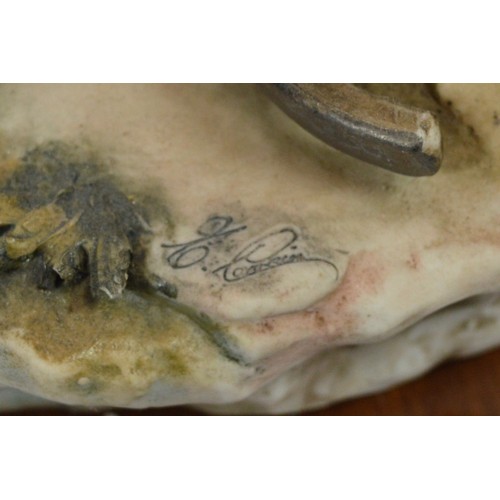 43 - Capodimonte; a large figural group, depicting a Romani woman with an infant on her lap and an adoles... 