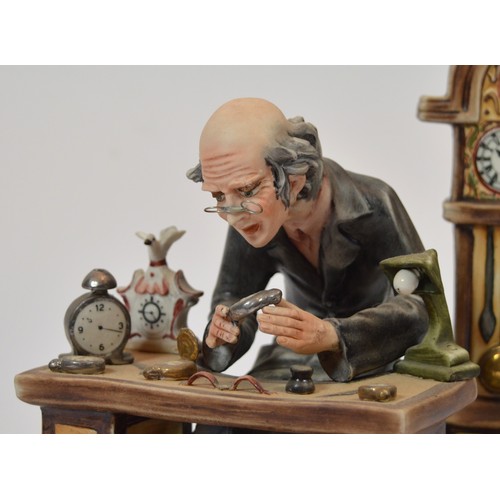 46 - Capodimonte; a figural porcelain sculpture entitled The Watchmaker, h. 24cm.