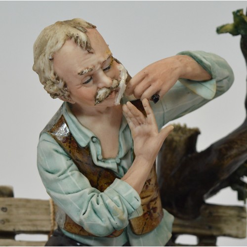 49 - Capodimonte; three figural porcelain sculptures, two depicting a shoemaker, h. 23cm, and another dep... 