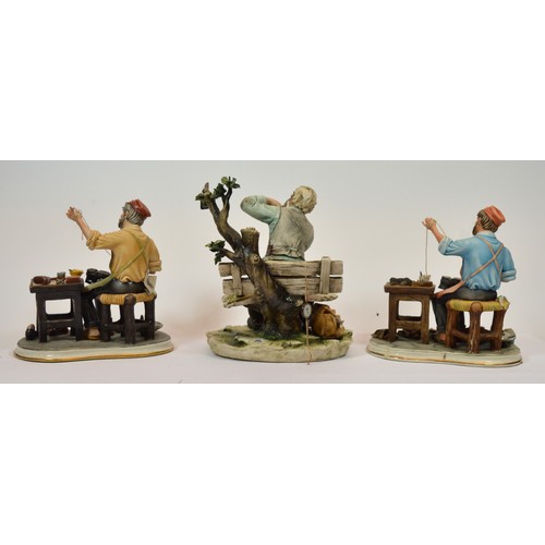 49 - Capodimonte; three figural porcelain sculptures, two depicting a shoemaker, h. 23cm, and another dep... 