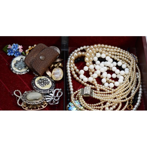 50 - A silver vesta case with striker to the bottom, Birmingham 1909, 22g, a silver clasped pearl necklac... 