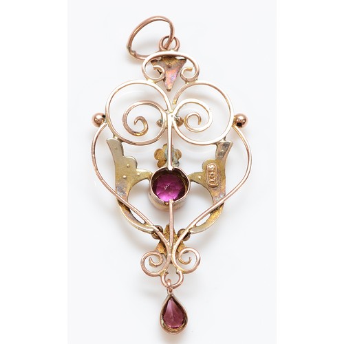 54 - An Edwardian 9ct gold garnet and seed pearl pendant, 45mm, 2.6g