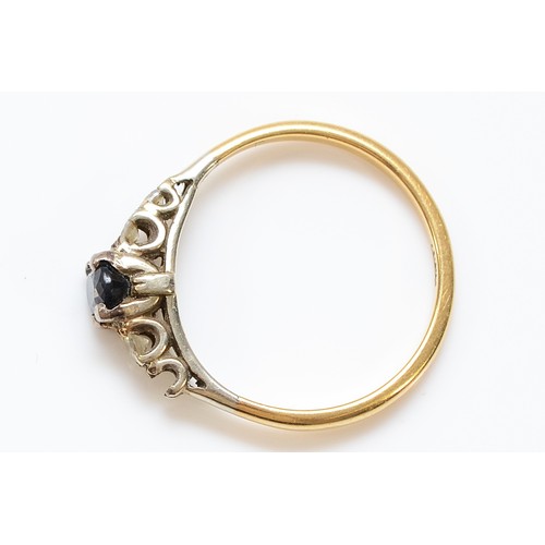 56 - An 18ct gold sapphire and brilliant cut diamond dress ring, one diamond setting vacant, N, 2.5g