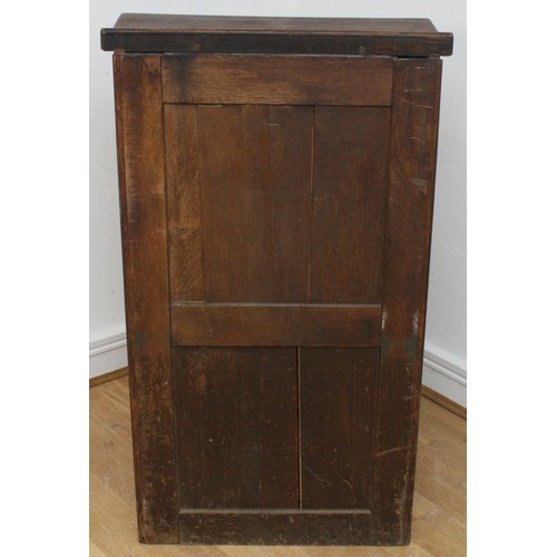 22 - An Edwardian oak roll-top desk, the tambour shutter enclosing interior with slide out writing surfac... 