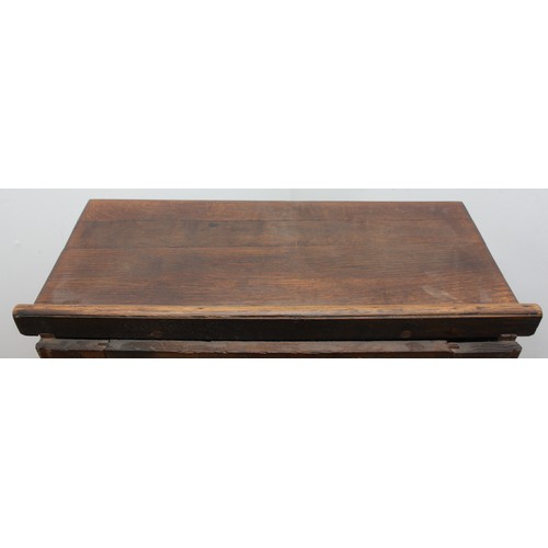 22 - An Edwardian oak roll-top desk, the tambour shutter enclosing interior with slide out writing surfac... 