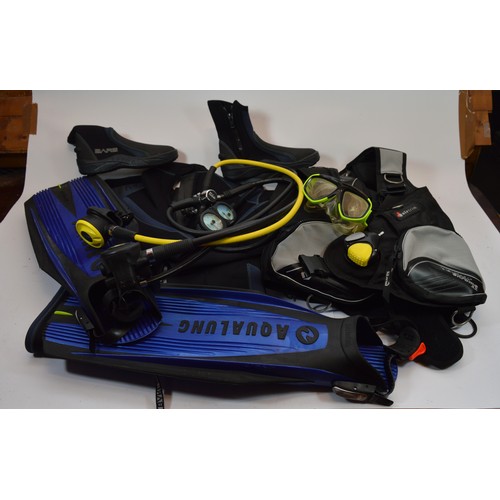 A selection of scuba diving equipment and clothing, to include a Mares R2 DFC regulator set, a Mares Vector Chrome A.T buoyancy control vest (BCD) size large, a Bare 7mm Arctic wetsuit, size XL, a pair of Bare neoprene boots, size 8, a pair of flippers, goggles and snorkel, in a Bare's carry holdall, as new unused condition.
