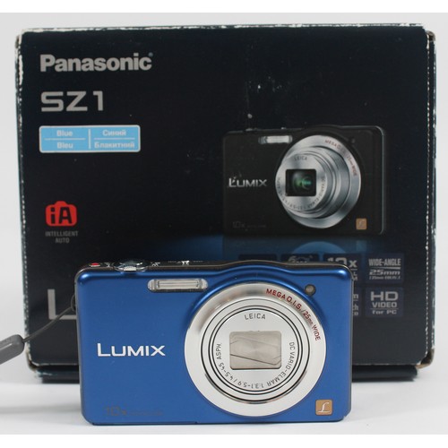 A Panasonic Lumix DMC-SZ1 digital camera with an in-built Leica lens, in blue, in original box.
