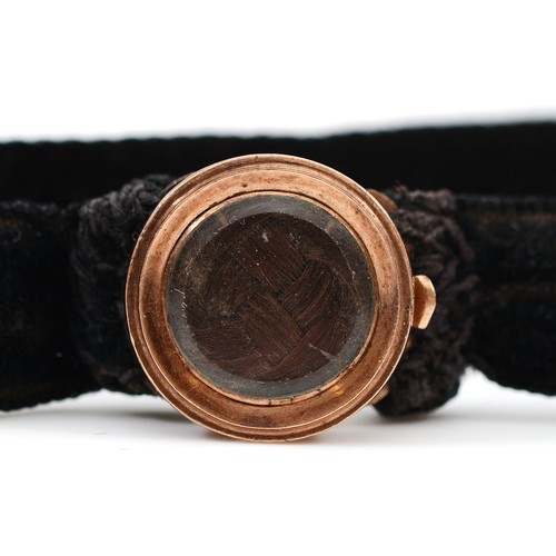 9 - An unmarked 9ct rose gold hair work clasped velvet necklace, 2.5g