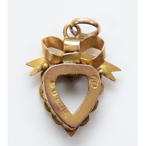 11 - A 9ct gold ruby and seed pearl heart pendant, 20mm, 1.5g