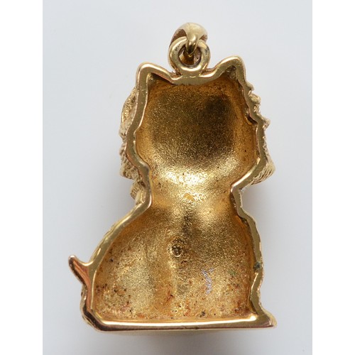 13 - A 9ct gold and diamond pendant in the form of a dog, 18mm, 3.8g